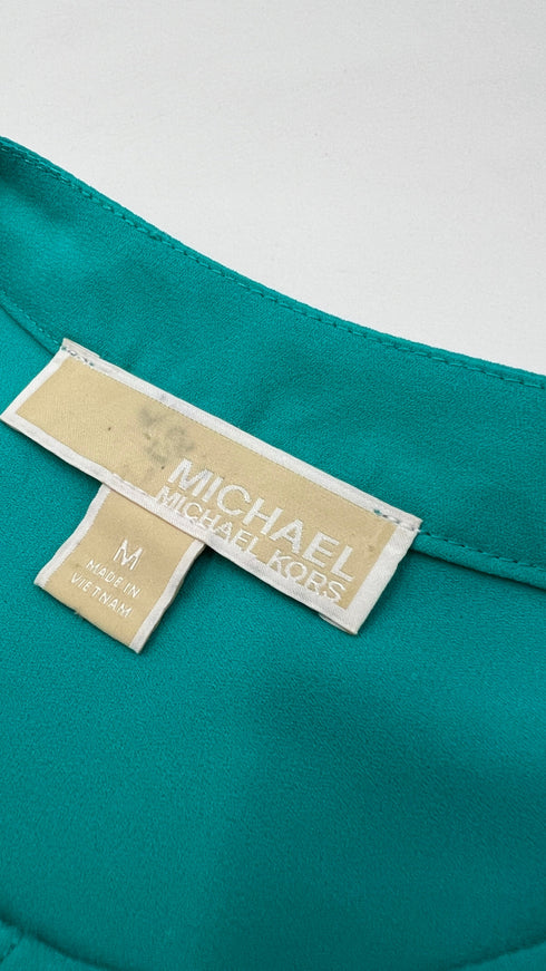 Blusa smanicata con dettagli dorati