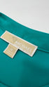 Blusa smanicata con dettagli dorati