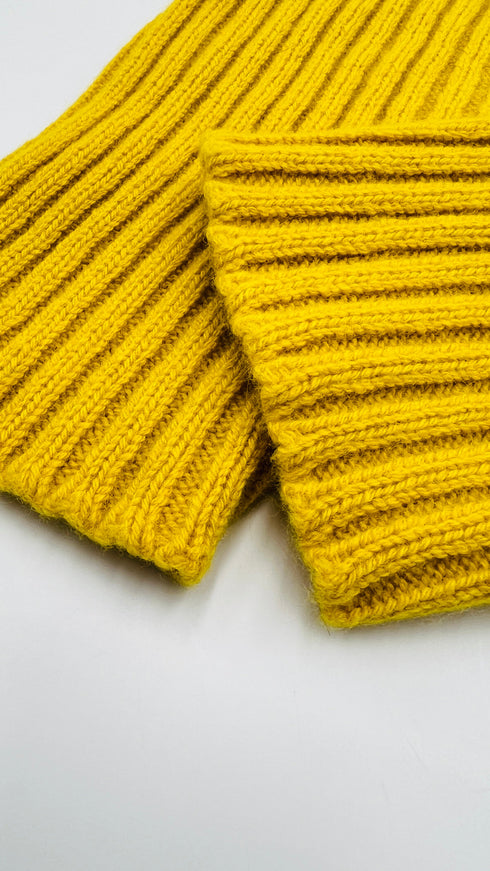 Coprispalle in maglia con cartellino