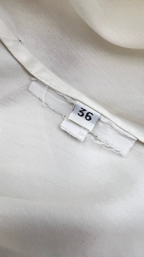 Top bianco smanicato