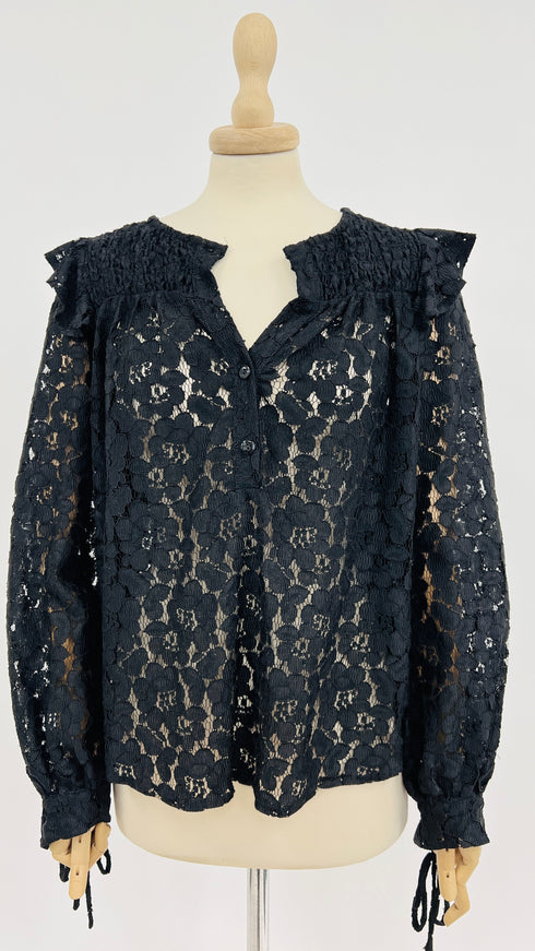 Top in pizzo con cartellino