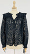 Top in pizzo con cartellino