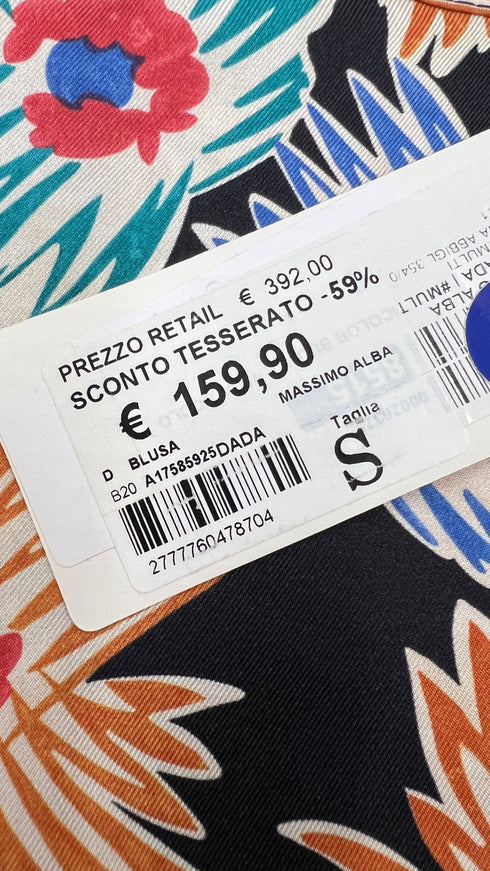 Top floreale con cartellino