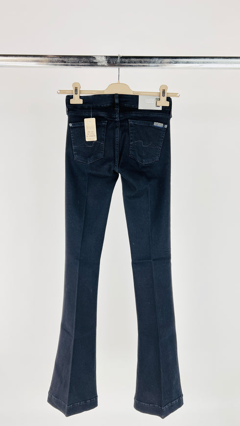 Jeans flare skinny con cartellino