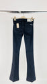 Jeans flare skinny con cartellino