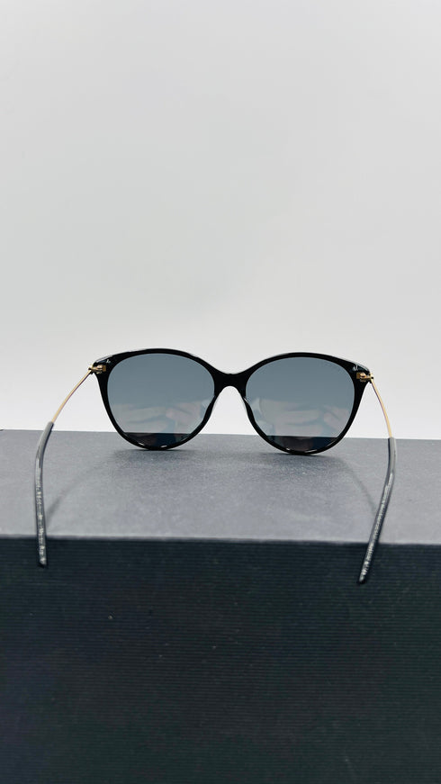 Occhiali da sole rotondi