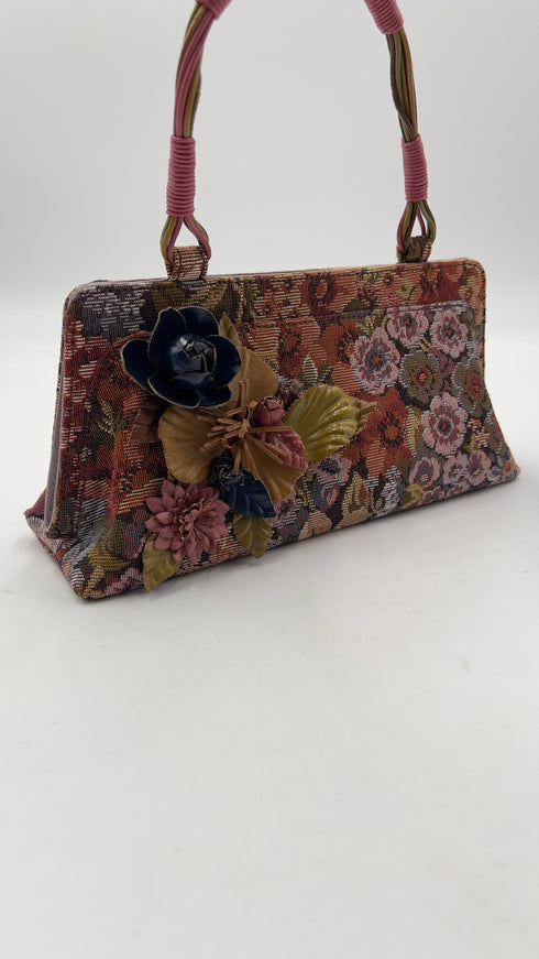 Clutch in jacquard con appliqués