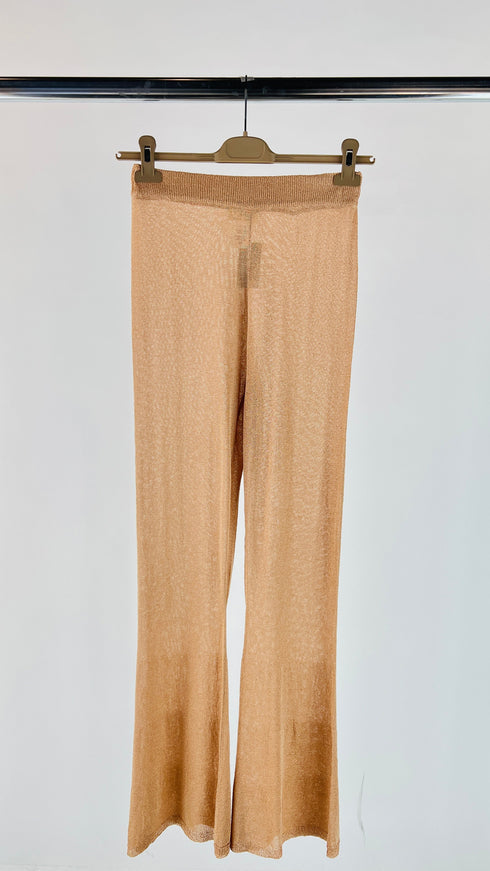 Pantaloni lurex a zampa