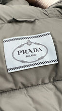 Piumino con cappuccio bordo pelliccia PRADA