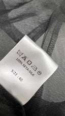 Blusa semitrasparente fiocco An
