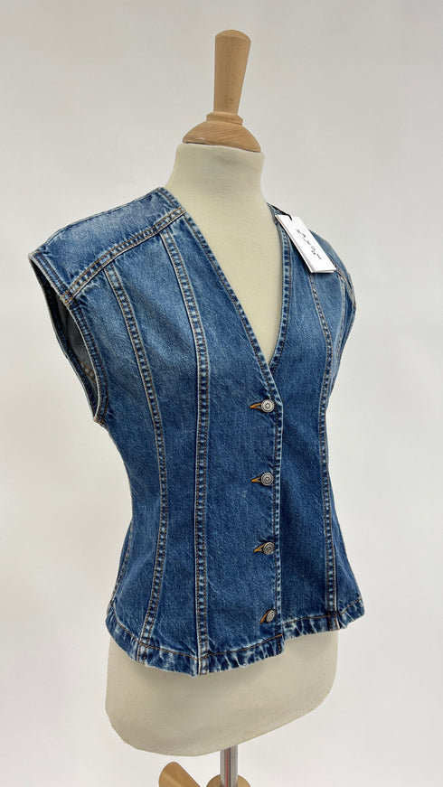 Gilet in denim con cartellino