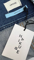 Gilet in denim con cartellino