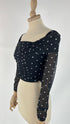 Cropped top arricciato a pois