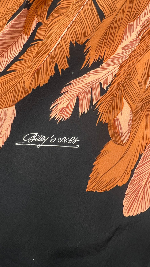 Abito midi fantasia piume