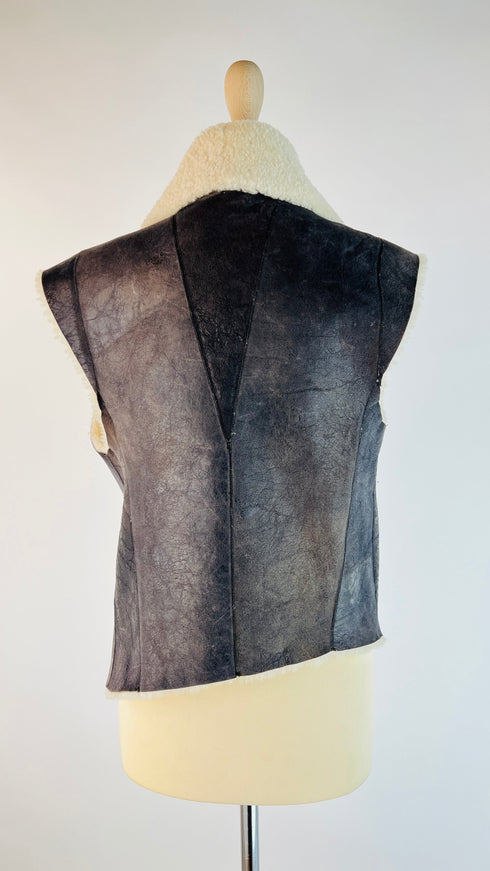 Gilet shearling asimmetrico