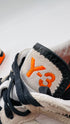 Sneakers dettagli in suede tallone