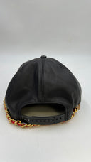 Cappello con mini borsa Moschino