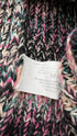 Soprabito in maglia con cartellino