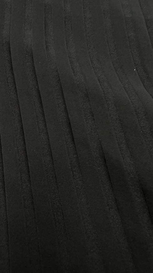 Top in seta a righe diagonali