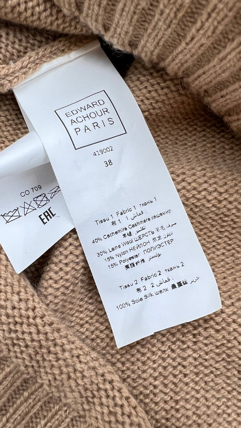 Dolcevita oversized con fiocchi