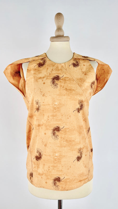 Top smanicato fantasia piume