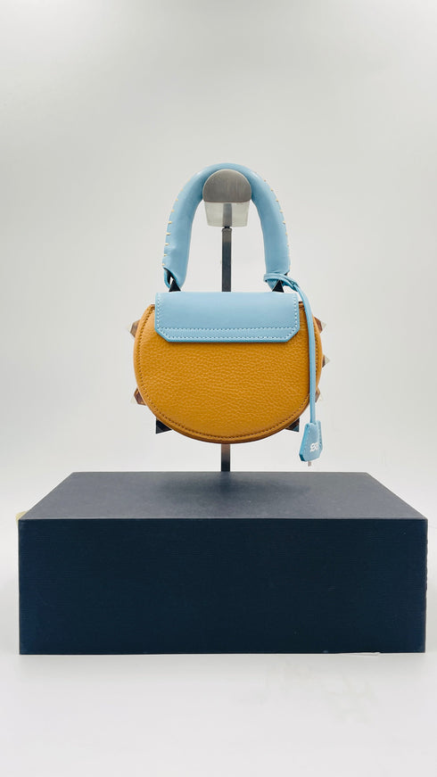 Borsa mini con tracolla e borchie