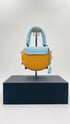 Borsa mini con tracolla e borchie