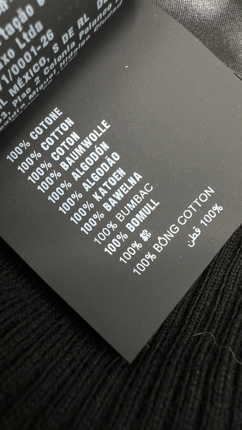 Maglia girocollo con cartellino