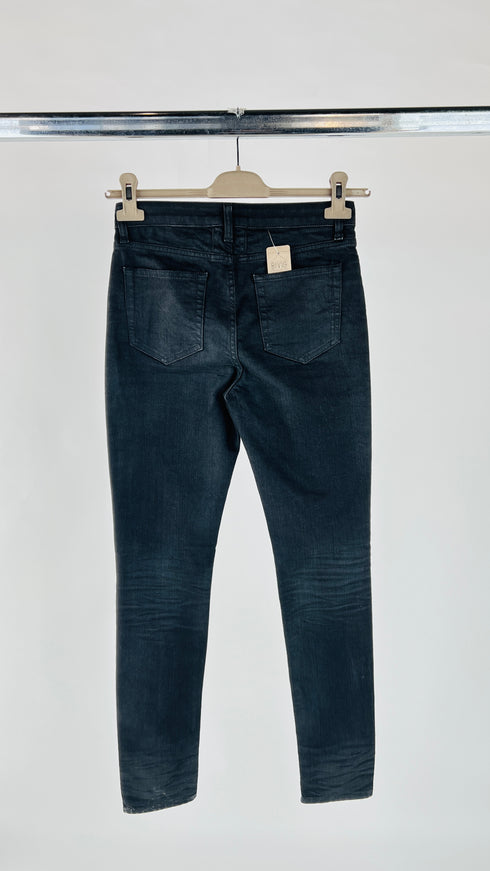 Skinny jeans strappi ginocchia