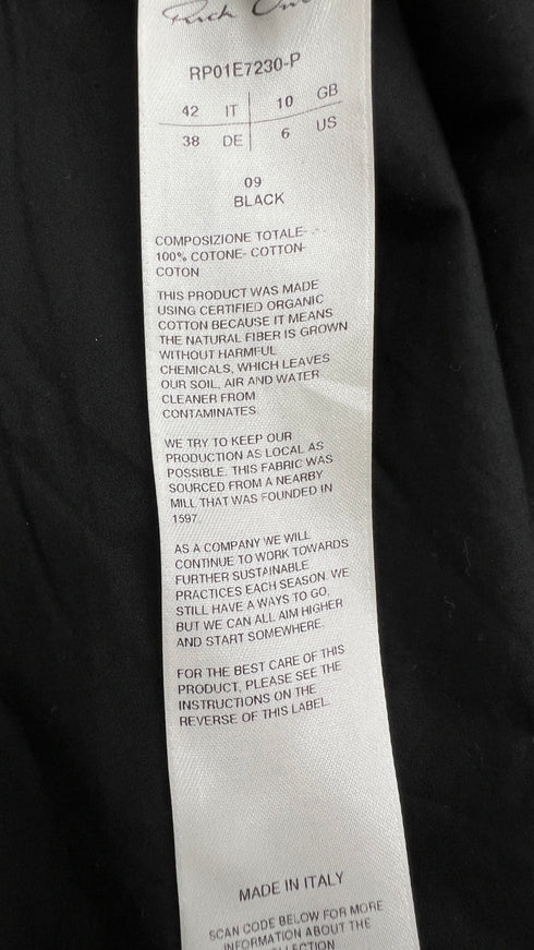 T-shirt over con cartellino