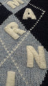 Maglione girocollo a losanghe