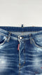 Jeans con patch a fiori
