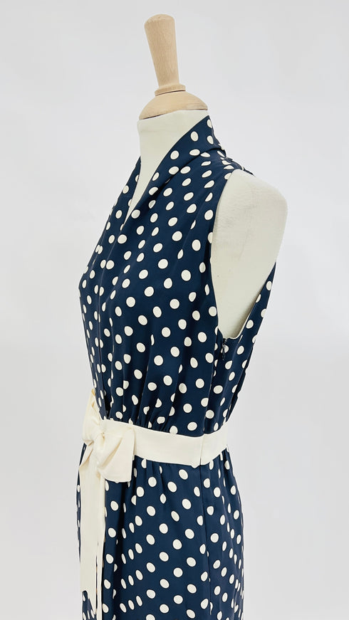 Abito corto a pois con fiocco