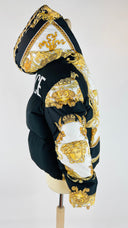 Piumino barocco logo Versace