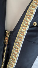 Piumino barocco logo Versace