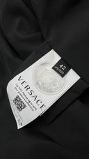 Piumino barocco logo Versace