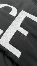 Piumino barocco logo Versace