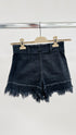 Shorts in denim sfrangiato