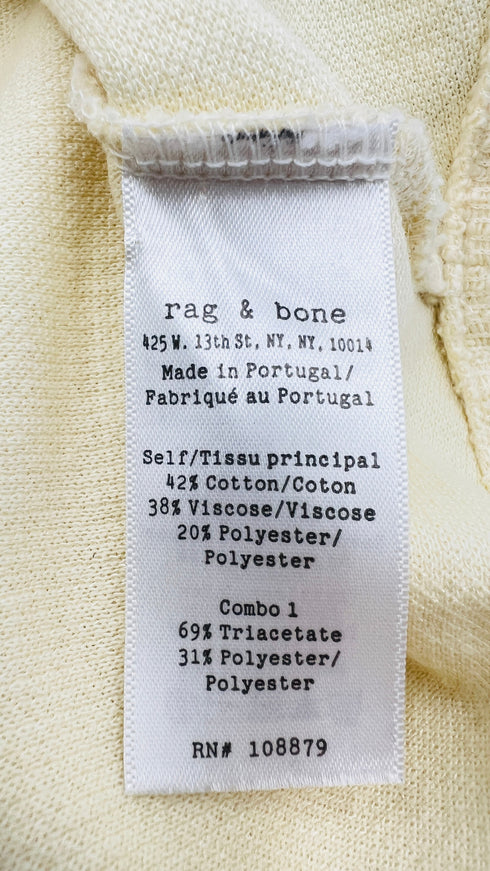 Maglia con zip con cartellino