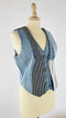 Gilet in denim con cartellino