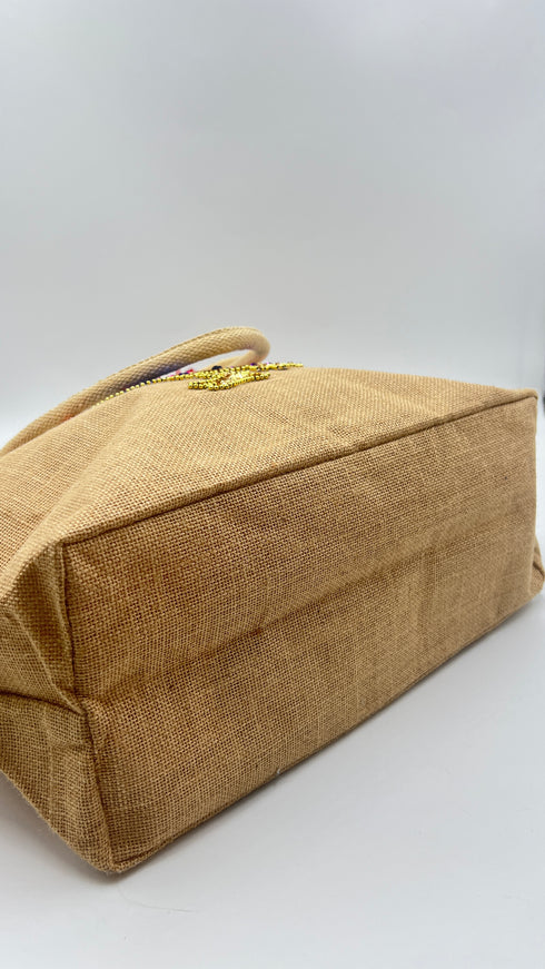 Borsa con appliqués e cartellino