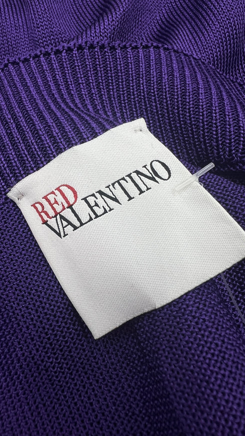Top in maglia con volant