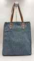 Tote-bag animalier azzurra con cartellino