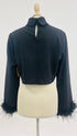 Top cropped piume