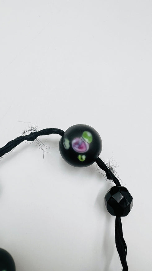 Collana vintage nera con perle dipinte