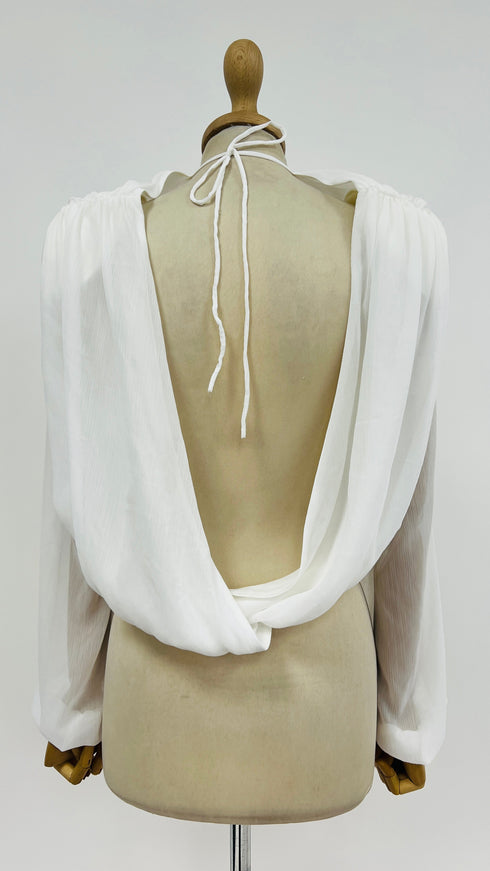 Blusa con spalline con cartellino