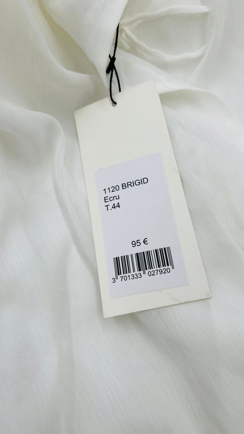 Blusa con spalline con cartellino
