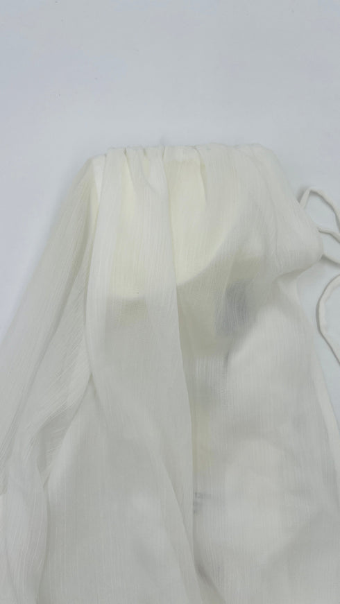 Blusa con spalline con cartellino