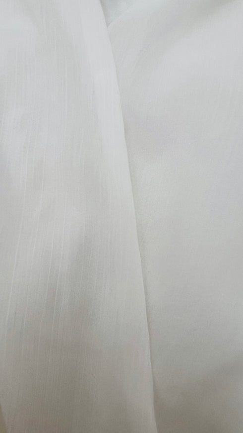 Blusa con spalline con cartellino