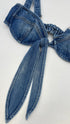 Top denim con nodo